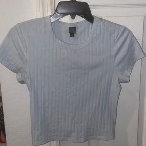 Light blue crop top with an open back